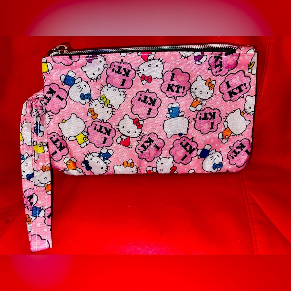 Hello Kitty Double Pocket Zip Wristlet. NIP